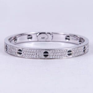 Silver bracelet with diamond accents.