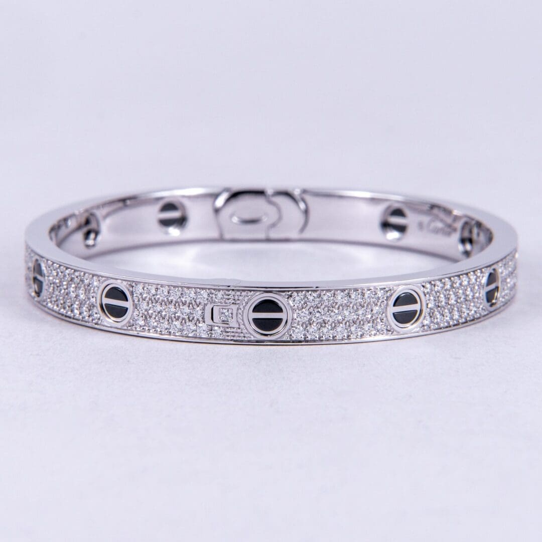 Silver bracelet with diamond accents.