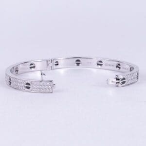 Silver bracelet with diamond accents.