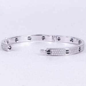 Silver bracelet with diamond accents.