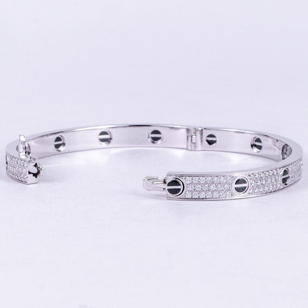 Silver bracelet with diamond accents.