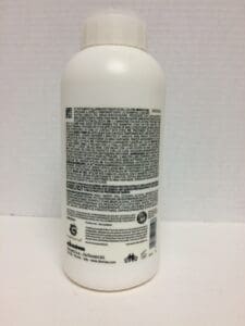 White bottle with black text label.