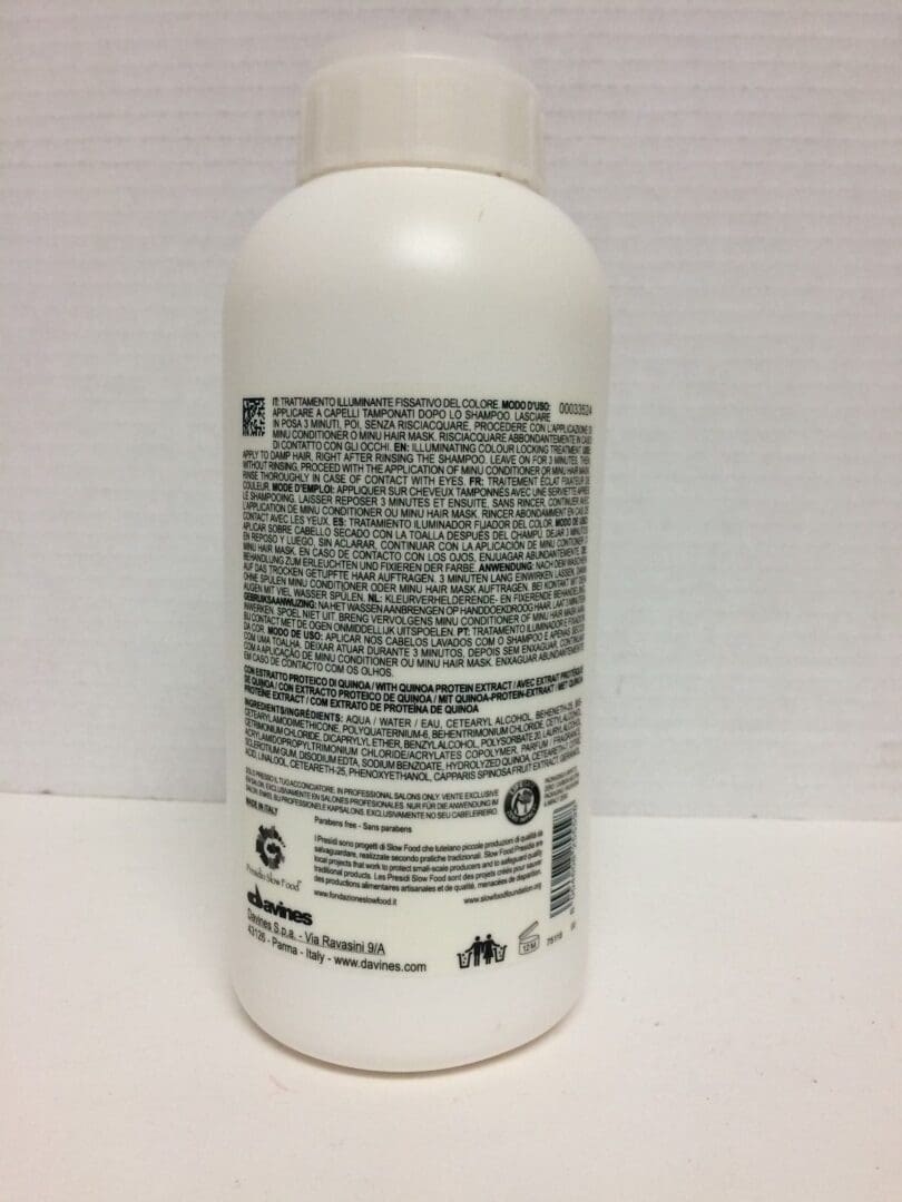 White bottle with black text label.