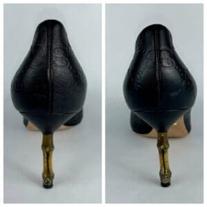 Black high heels with embossed design.