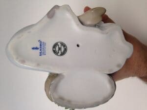 Base of a Lladro porcelain figurine.