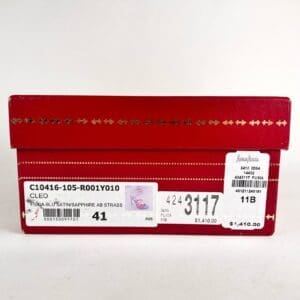 Red shoe box with price tags.