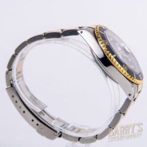 Luxury watch with metal and gold accents.