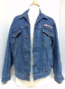 Blue denim jacket on a mannequin display.