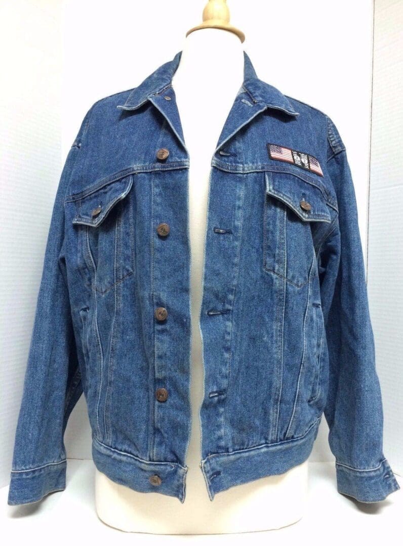 Blue denim jacket on a mannequin display.