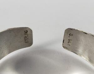 Silver bracelet with "STERLING" inscription inside.