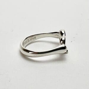 Silver ring with unique design.