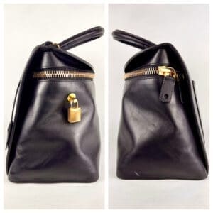 Black leather handbag with gold lock.