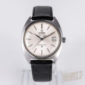 Vintage Omega Constellation watch with date display.