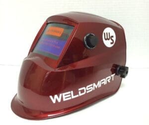 Red Weldsmart welding helmet on display.