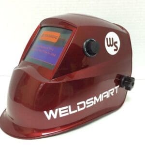 Red Weldsmart welding helmet on display.