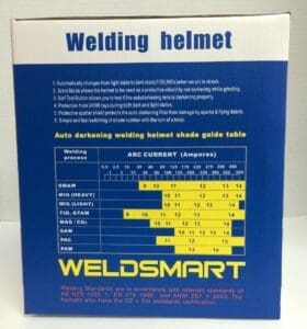 Welding helmet packaging with shade guide table.