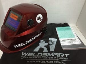 Red Weldsmart welding helmet and accessories.